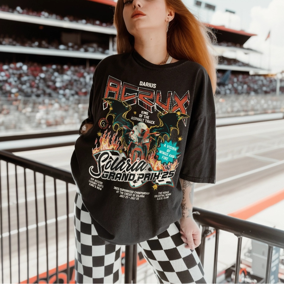 A soft, black, comfort colors tee with a Darius Acrux Superbike Racing inspired graphic print on it for fans of the Zodiac Academy series. The model is wearing an oversized fit to give a thrifted look. The idea behind the design is to give a subtle not to a book rather than an actual racing competition. 